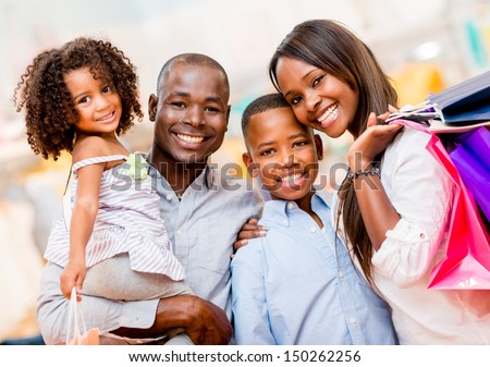 Portrait Of A Family Shopping And Looking Very Happy