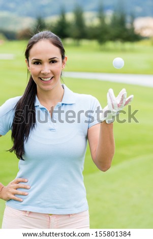 Confident golf player at the course looking happy