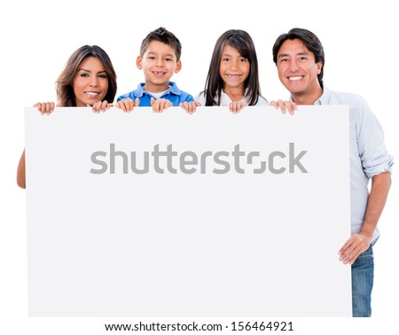 Happy family with a banner ad - isolated over white background