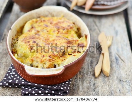 Cabbage gratin on rustic background