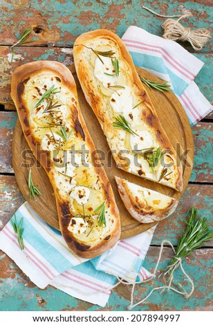flat bread  with potatoes and goat cheese