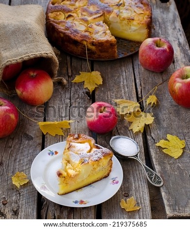 apple sour cream pie in autumn surroundings