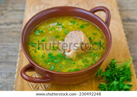 chicken soup with the stuffed chicken neck. Jewish cuisine. selective focus