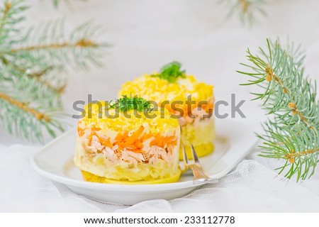 traditional Russian vegetable salad with a salmon Mimosa.selective focus