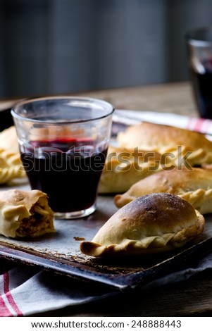 Empanadas ,traditional Argentina pies. style vintage. selective focus. the image is tinted