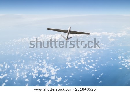Unmanned aerial vehicle in the cloudy sky