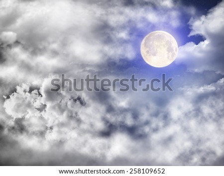 Blue Starry sky with the bright moon.Photography includes a display unit NASA