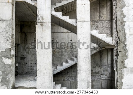 View of the Concrete stairs, and concrete blocks in an unfinished House
