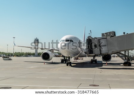 May 31, 2015.Saint Petersburg.Russia. Plane with boarding ramp at the airport Pulkovo.