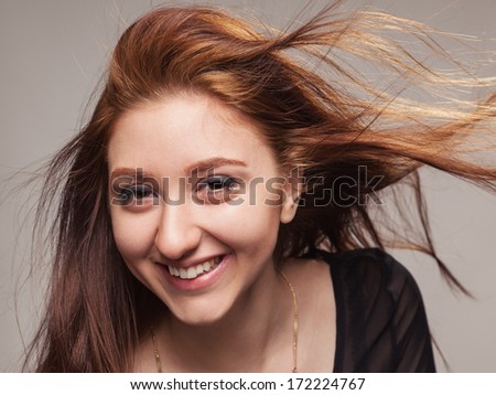 Portrait of beautiful girl with magnificent hair