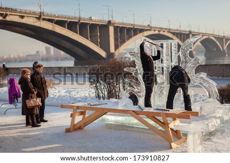 KRASNOYARSK, RUSSIA - JAN 17, 2014: Exhibition of paintings winter theme. Festival 