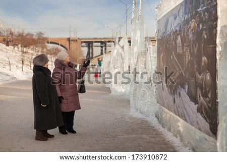 KRASNOYARSK, RUSSIA - JAN 17, 2014: Exhibition of paintings winter theme. Festival \