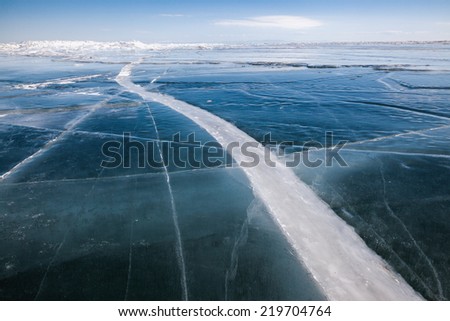 Frozen crack ice in the ice of Lake Baikal
