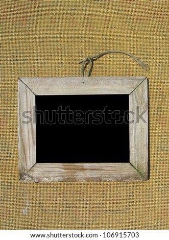 Old wooden picture frame on the wall texture. Template for the design of photo albums.