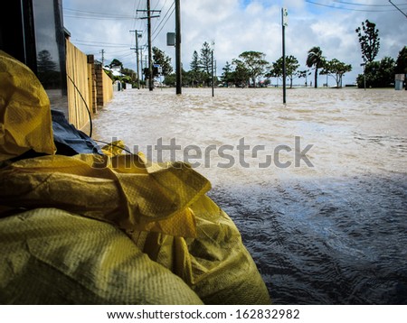 BRISBANE, QLD, AUSTRALIA - January 27: Sandbags protecting a local business during the floods in Sandgate, Brisbane on 27 January 2013