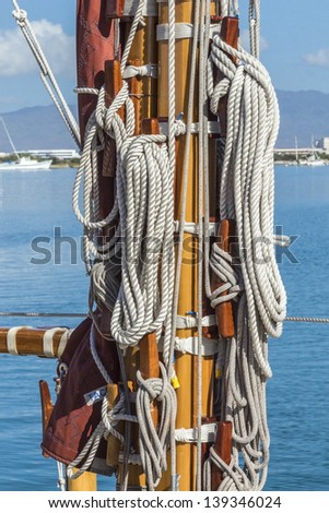 Details of sail rope on the mast of a sailboat