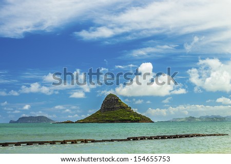 Mokolii, also known as Chinaman\'s Hat, a well-known landmark island off the windward coast of Oahu, Hawaii