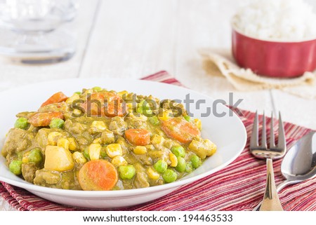 Curry stew made with ground beef, peas, carrots and corn, a common meal in Hawaii