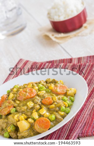 Curry stew made with ground beef, peas, carrots and corn, a common meal in Hawaii