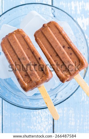 Hawaiian ice pops made with shaved coconut and sweetened adzuki beans