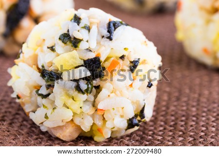 Hawaiian rice balls mixed with spam, carrots, daikon and Korean seaweed