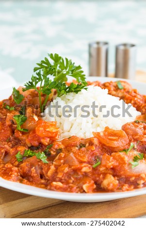 Gravy made with salmon, tomato sauce and onions, served with rice, a common meal in Hawaii