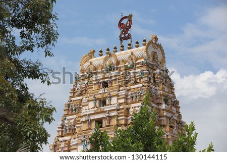 Hindu Temple Tower. Tree framed view of Gopuram or tower