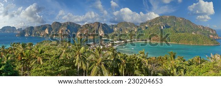Travel vacation background - Tropical island with resorts - Phi-Phi island, Krabi Province, ThailandBuddhist and Hindu motifs.