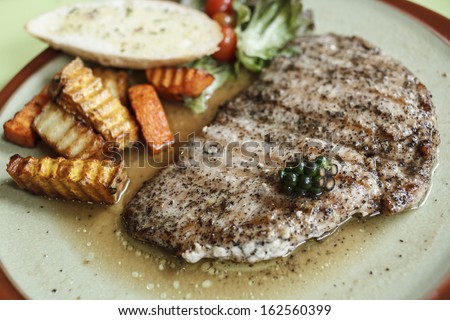 Hot pepper steak in plate