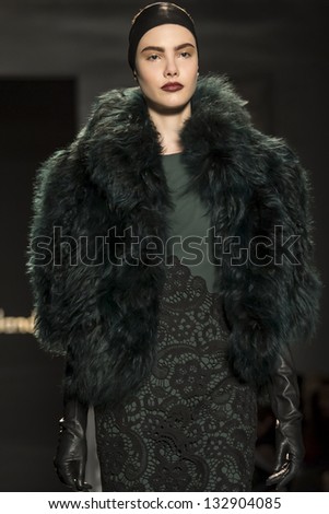 NEW YORK - FEBRUARY 11: A model is walking the runaway at Pamella Roland Show for Fall/Winter 2013 Collection during Mercedes-Benz Fashion Week on February 11, 2013 in New York