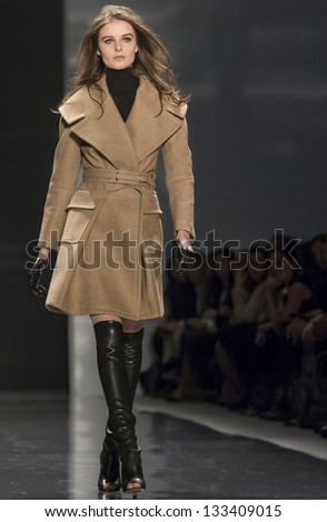 NEW YORK - FEBRUARY 11: A model is walking the runaway at Kaufman Franco Show for Fall/Winter 2013 Collection during Mercedes-Benz Fashion Week on February 11, 2013 in New York