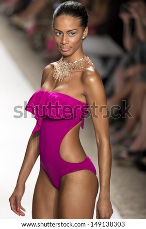 MIAMI - JULY 21: A model is walking the runway at L*Space By Monica Wise for 2014 collection during Mercedes-Benz Fashion Week Swim on July 21, 2013 in Miami