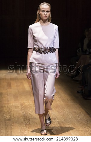 NEW YORK - SEPTEMBER 03 2014: A model is walking the runway at Josie Natori Spring 2015 Ready-to-Wear Show during Mercedes-Benz Fashion Week at Dimenna Center for Classical Music