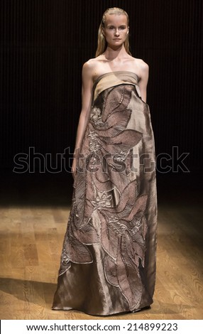 NEW YORK - SEPTEMBER 03 2014: A model is walking the runway at Josie Natori Spring 2015 Ready-to-Wear Show during Mercedes-Benz Fashion Week at Dimenna Center for Classical Music