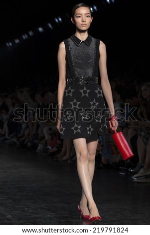 NEW YORK, NY - SEPTEMBER 09: Fei Fei Sun walks the runway at the Diesel Black Gold Spring 2015 Collection at Skylight at Moynihan Station September 9, 2014