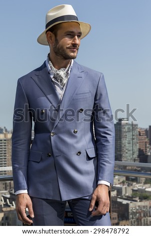 NEW YORK, NY - JULY 16, 2015: Model Parker Gregory poses at Hickey Freeman presentation as part of New York Fashion Week Men\'s S/S 2016 at The Standard, East Village