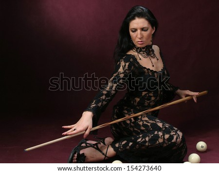 beautiful young women with accessories for billiards