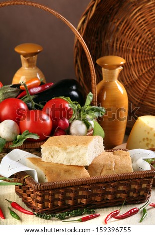macro bread and vegetables in wicker baskets