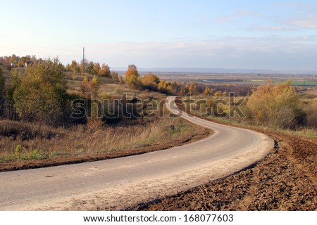 autumn landscape Russian spaces and a driveway leading to the horizon