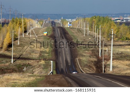 autumn landscape Russian spaces and a driveway leading to the horizon