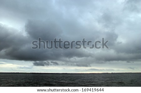 Beautiful river landscape in cloudy weather in summer
