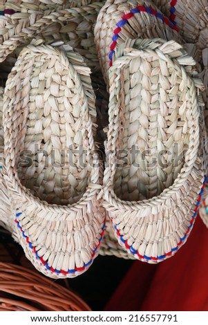 close-up texture of natural material handmade pair of bast shoe