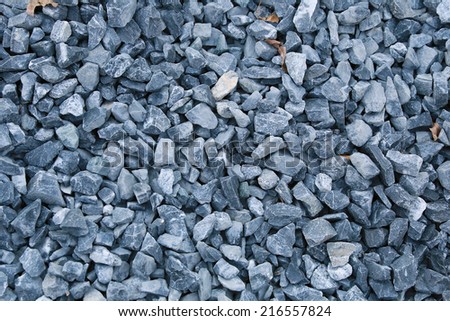 macro texture isolated crushed gray stone in natural lighting