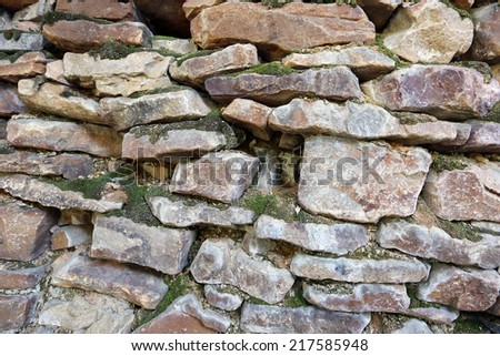 macro texture isolated fragment stone wall in natural lighting