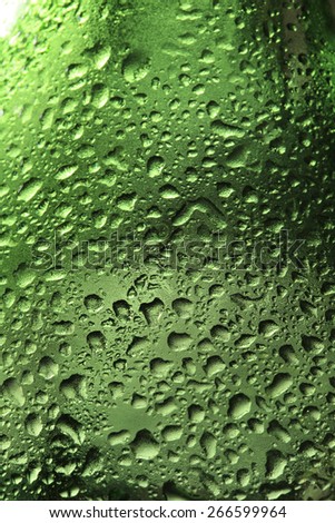 macro texture water drops on green glass studio