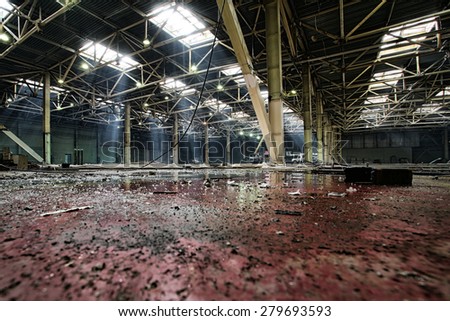 industrial interior of an abandoned building and repair work on the initial stage