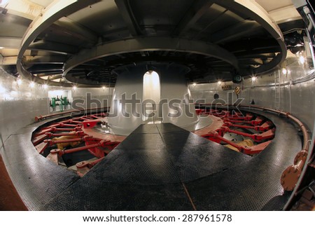 Industrial interior close-up generator stator, hydroelectric turbine hall