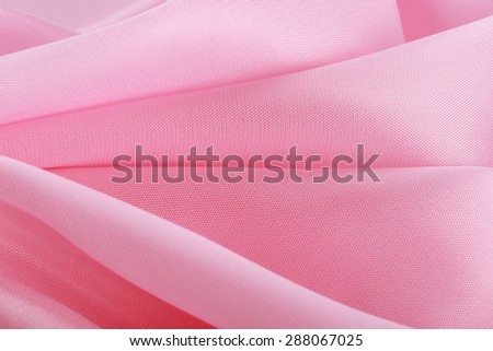macro texture of pale pink fabric studio