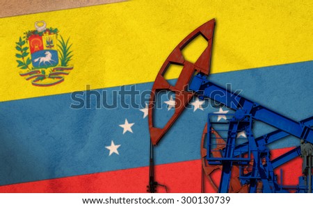 close-up of the oil pump on background of the flag Venezuela