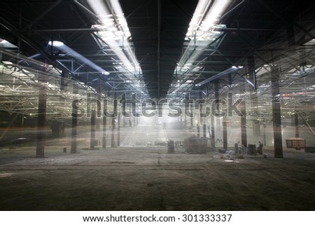 industrial interior of an abandoned building and repair work on the initial stage